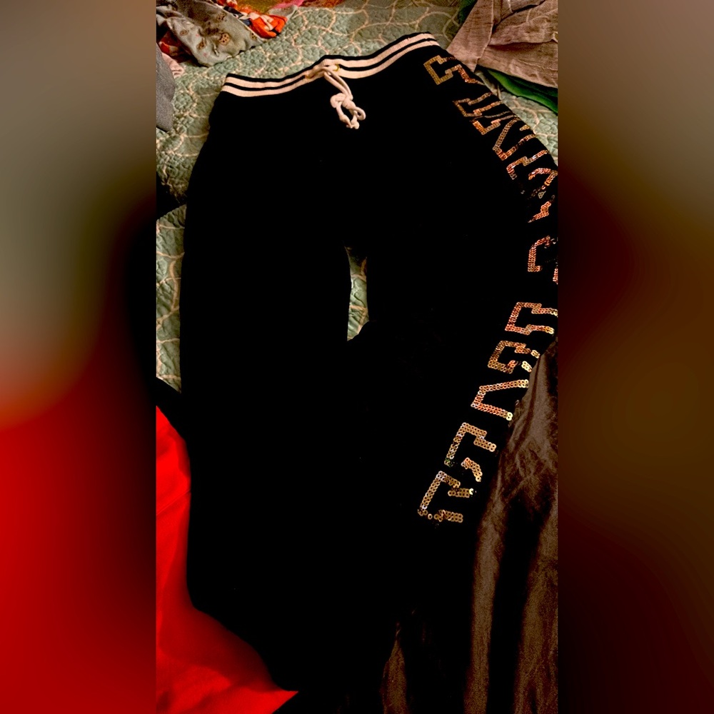 Pink brand sweats glitter name on side